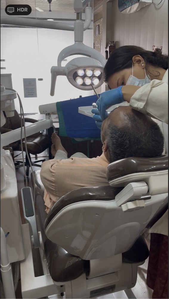 Dr Shivangi Sharma treating a patient at Bhuvneshwari Dental Clinic Haridwar